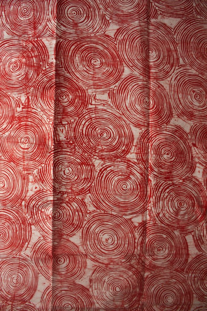 Red circles batik fabric from Urbanstax online fabric store